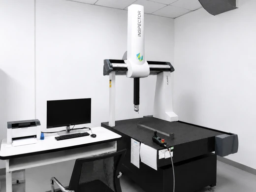 Coordinate measuring machine used for precision dimensional inspection in a quality control laboratory.